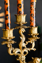 Bougeoir guépard en or antique