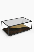 Belle table basse en métal bruni et verre