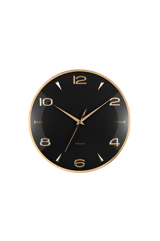 Horloge murale noire et dorée