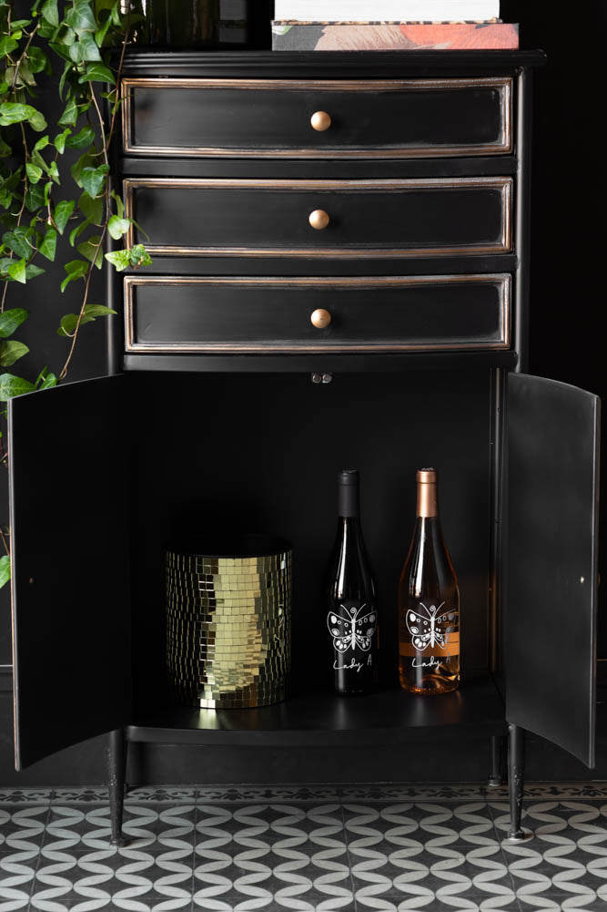 Meuble d'appoint noir et or de style antique