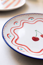 Assiette de service en céramique à imprimé cerises