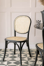 Chaise de salle à manger en bois noir et canne tressée Chez Pitou