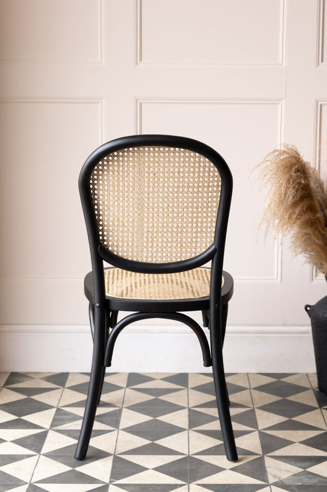 Chaise de salle à manger en bois noir et canne tressée Chez Pitou