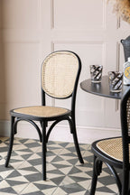 Chaise de salle à manger en bois noir et canne tressée Chez Pitou