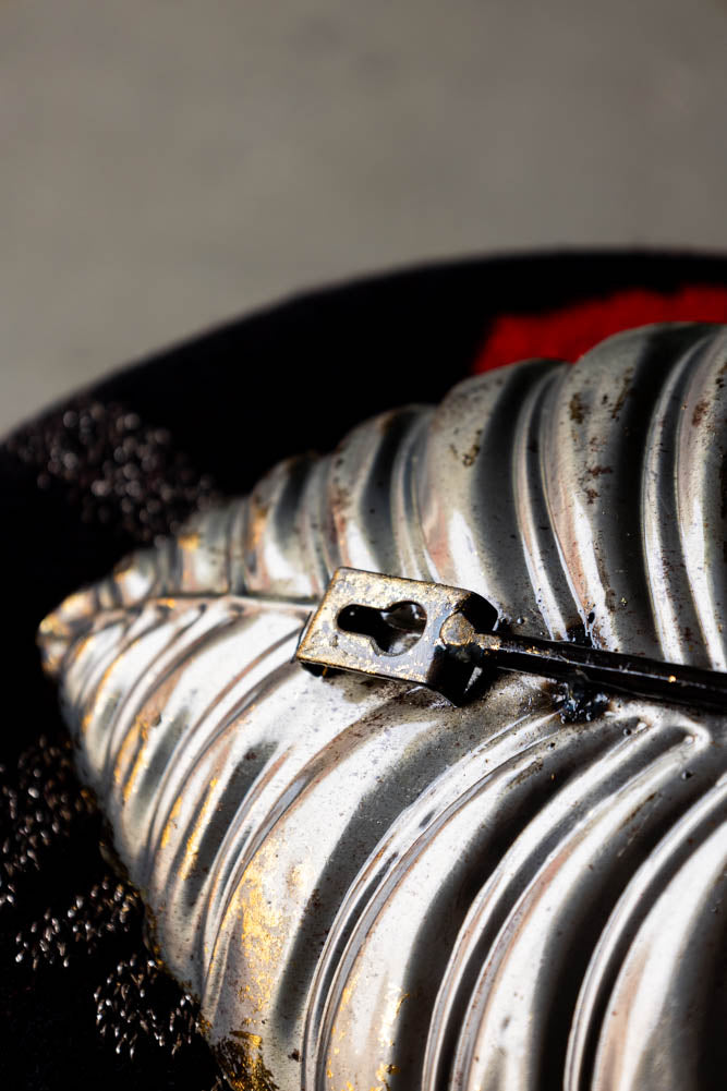 Applique murale à bougie effet feuille de fromage doré