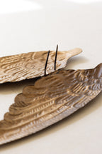 Décoration de bougie en métal ailé doré