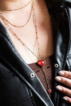 Collier chaîne superposée cœur et étoile en or et rouge