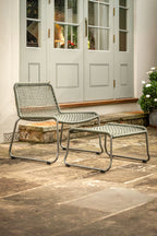 Ensemble de chaises longues et repose-pieds de jardin verts