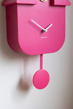 Horloge murale moderne à coucou rose vif