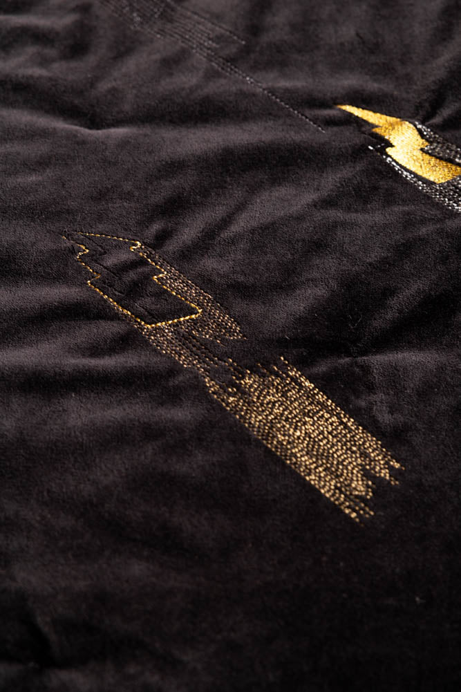 Couverture réversible noire à imprimé léopard et amour