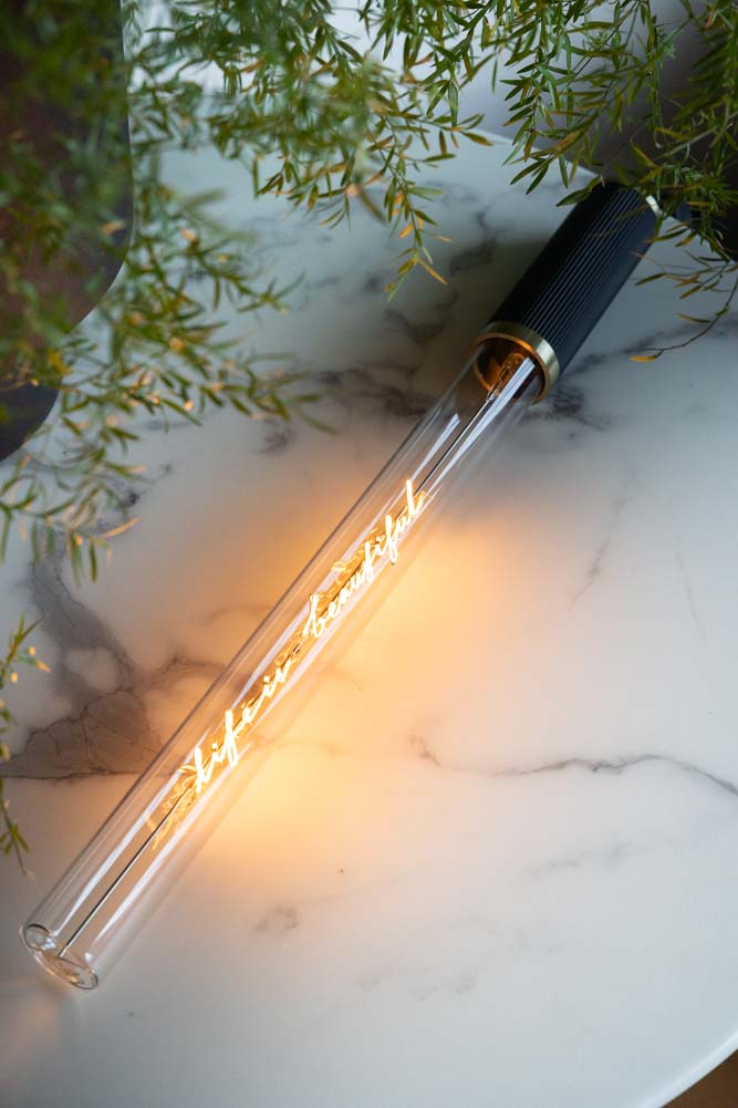 Message dans un tube lumineux - La vie est belle