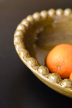 Bol en céramique vert olive en forme de bobine