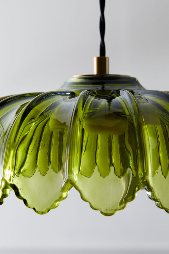 Suspension dorée et verte en forme de palmier de l'île du désert