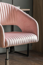 Chaise pivotante en velours rose côtelé