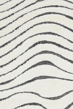 Le tapis Ariana en motif ondulé monochrome - Disponible en 3 tailles