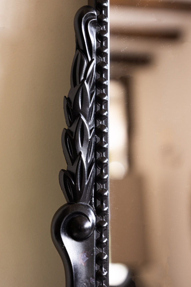 Miroir décoratif à cadre noir d'inspiration vintage