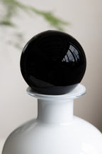 Flacon d'apothicaire blanc et noir